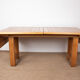 Large extendable dining table in solid oak by Guillerme and Chambron.