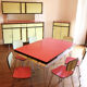 Table et chaises rockabilly en Formica structure Eiffel.