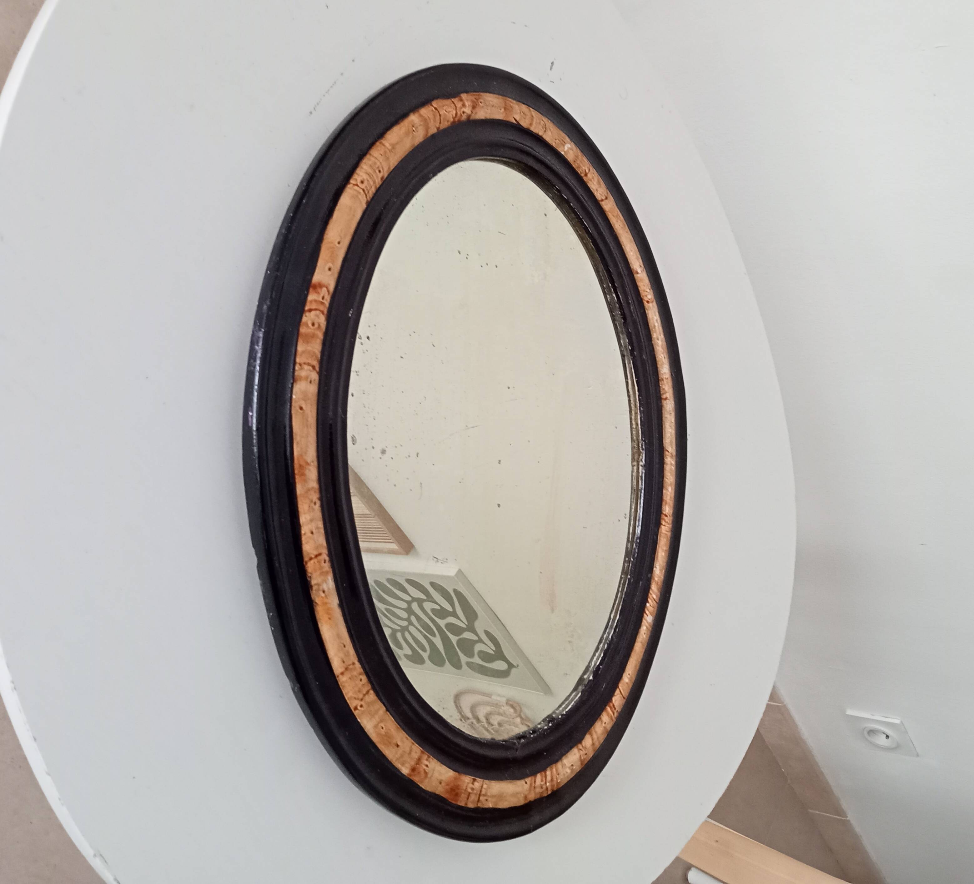 19th-century antique mirror in wood and stucco.