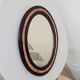 19th-century antique mirror in wood and stucco.