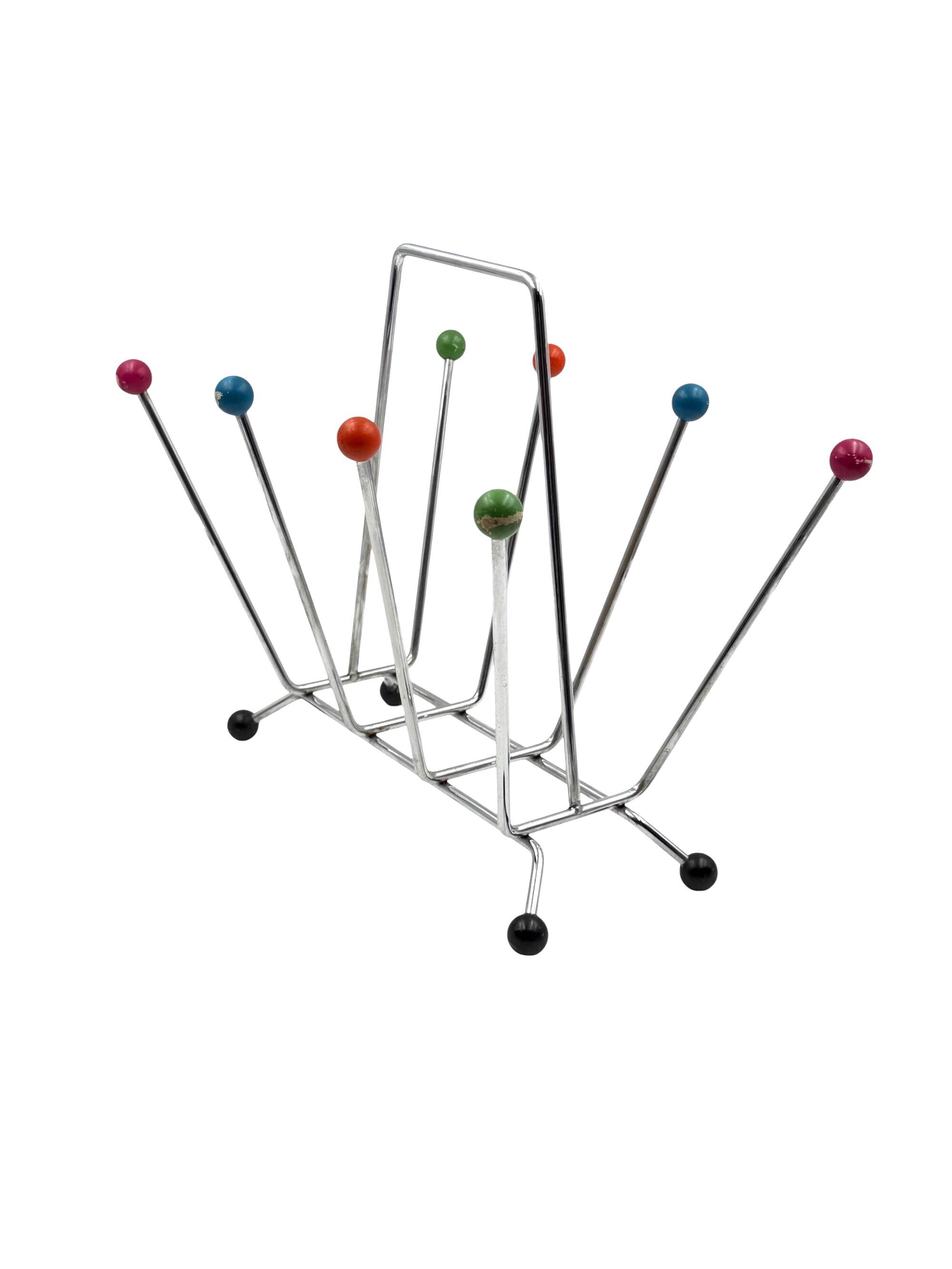 Space age magazine rack, in the manner of Charles and Ray Eames, Italy 1970