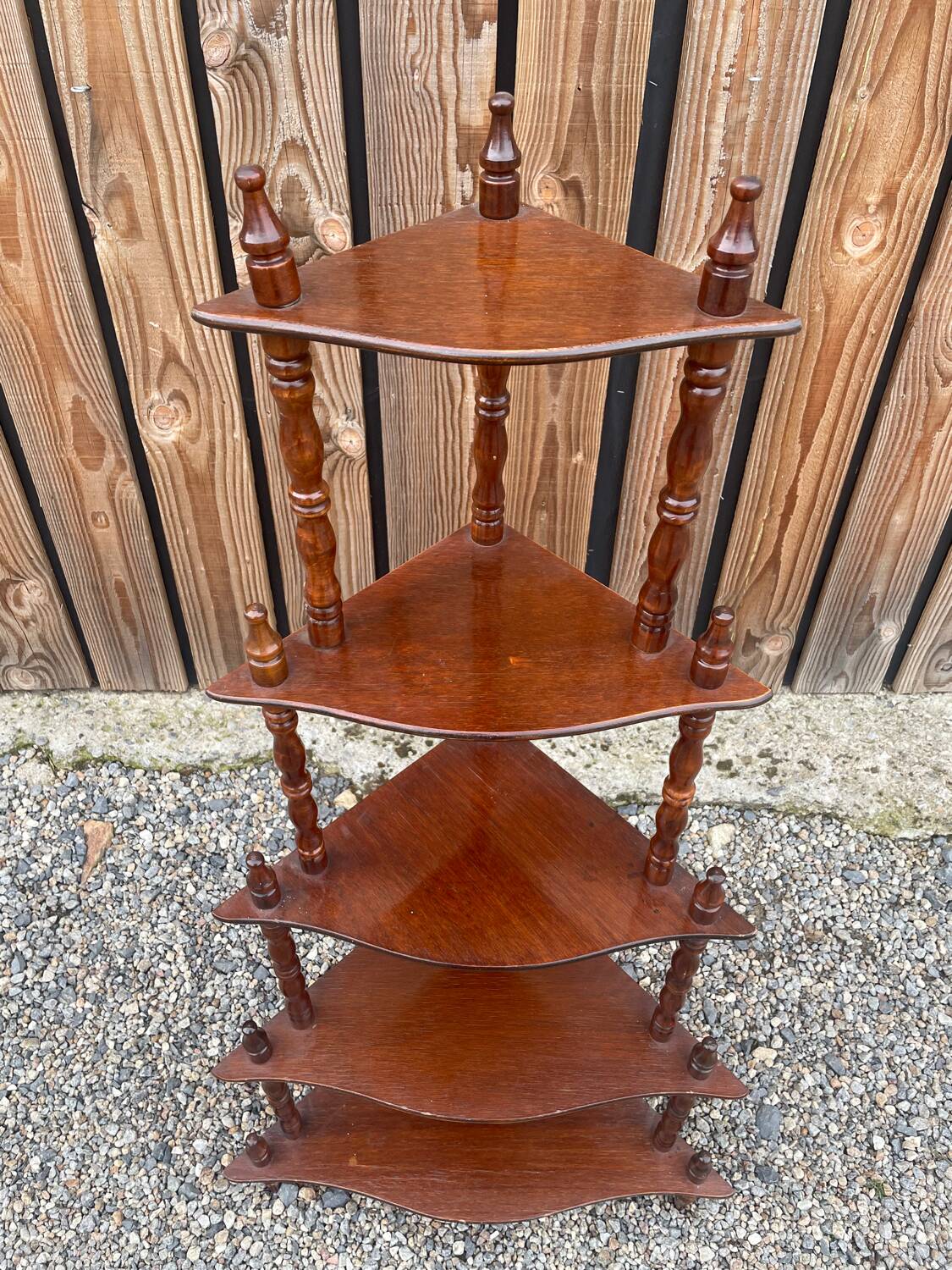Wooden corner shelf on legs with 5 shelves