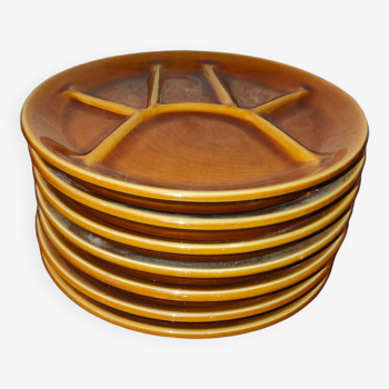 7 brown fondue plates in earthenware of Saint Amand