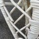 Pair of white peacock rattan chairs, circa 1960