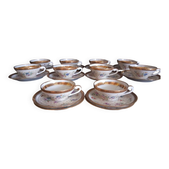 Set of 10 cups with undercuts worked with gold leaf, in Limousine porcelain from Limoges