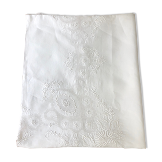 White coat embroidered floral patterns
