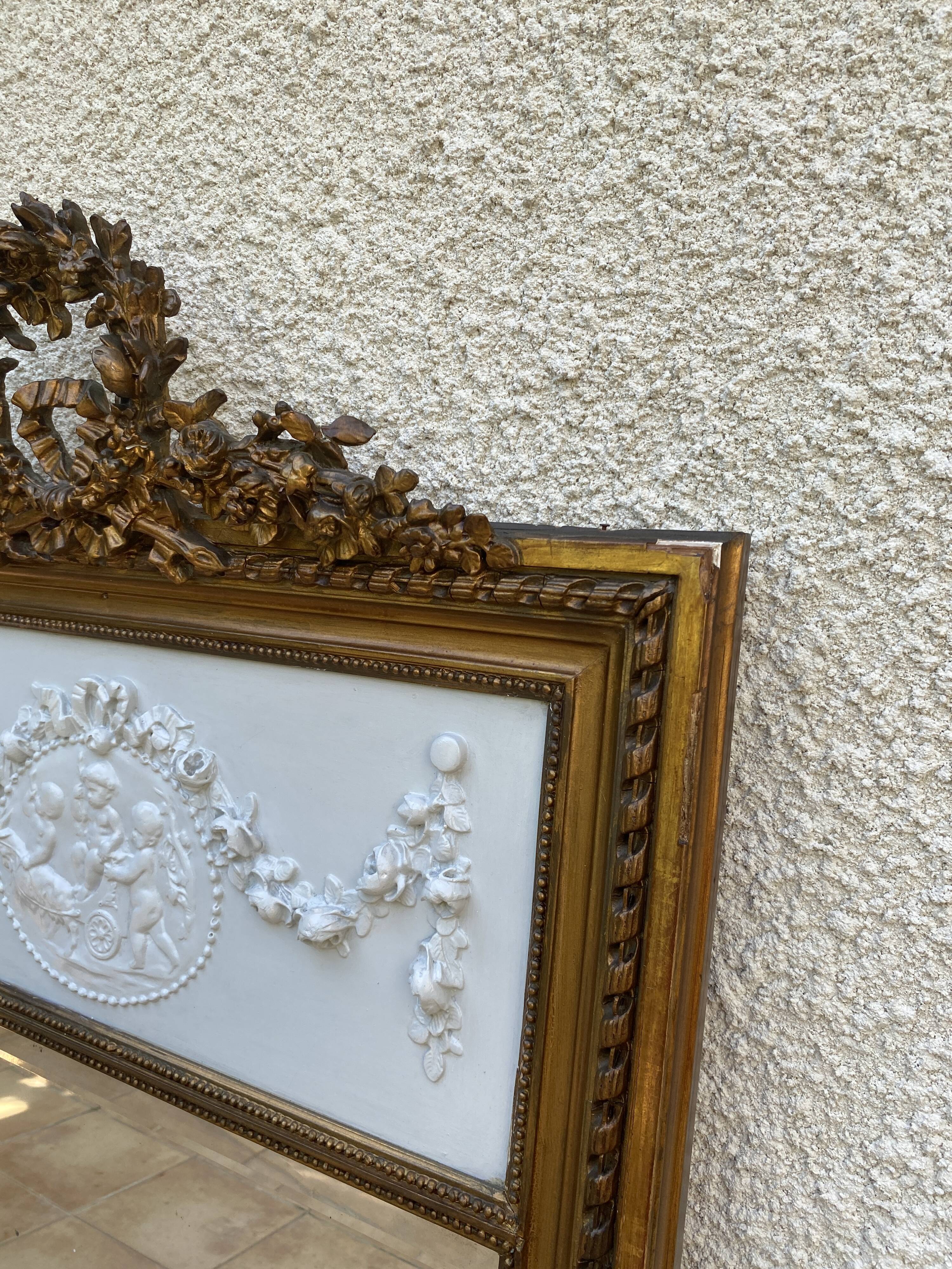 19th century Louis XVI style mirror in wood gilded with gold leaf, 74x150cm