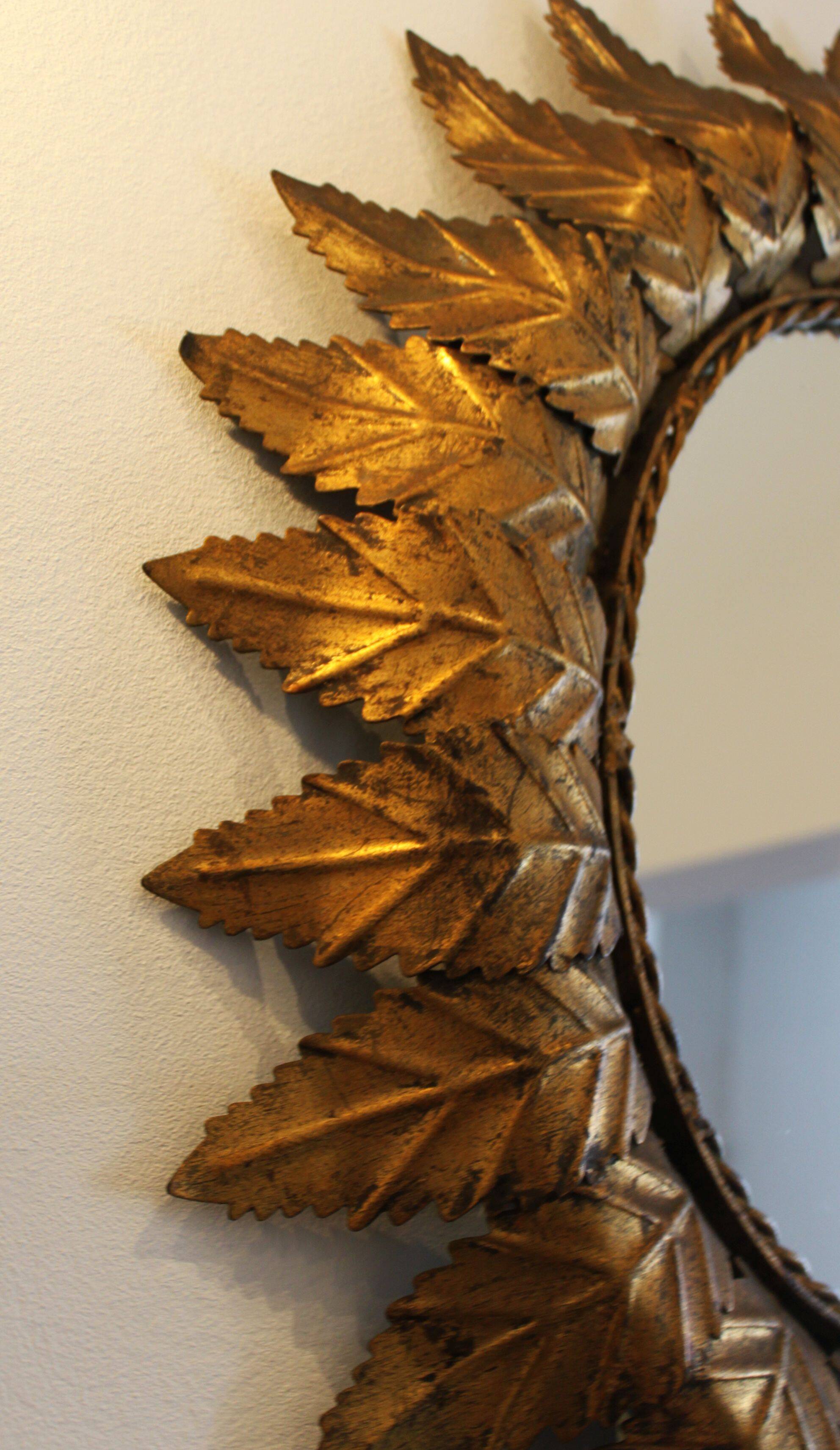 Oval sun mirror, 61x52cm.