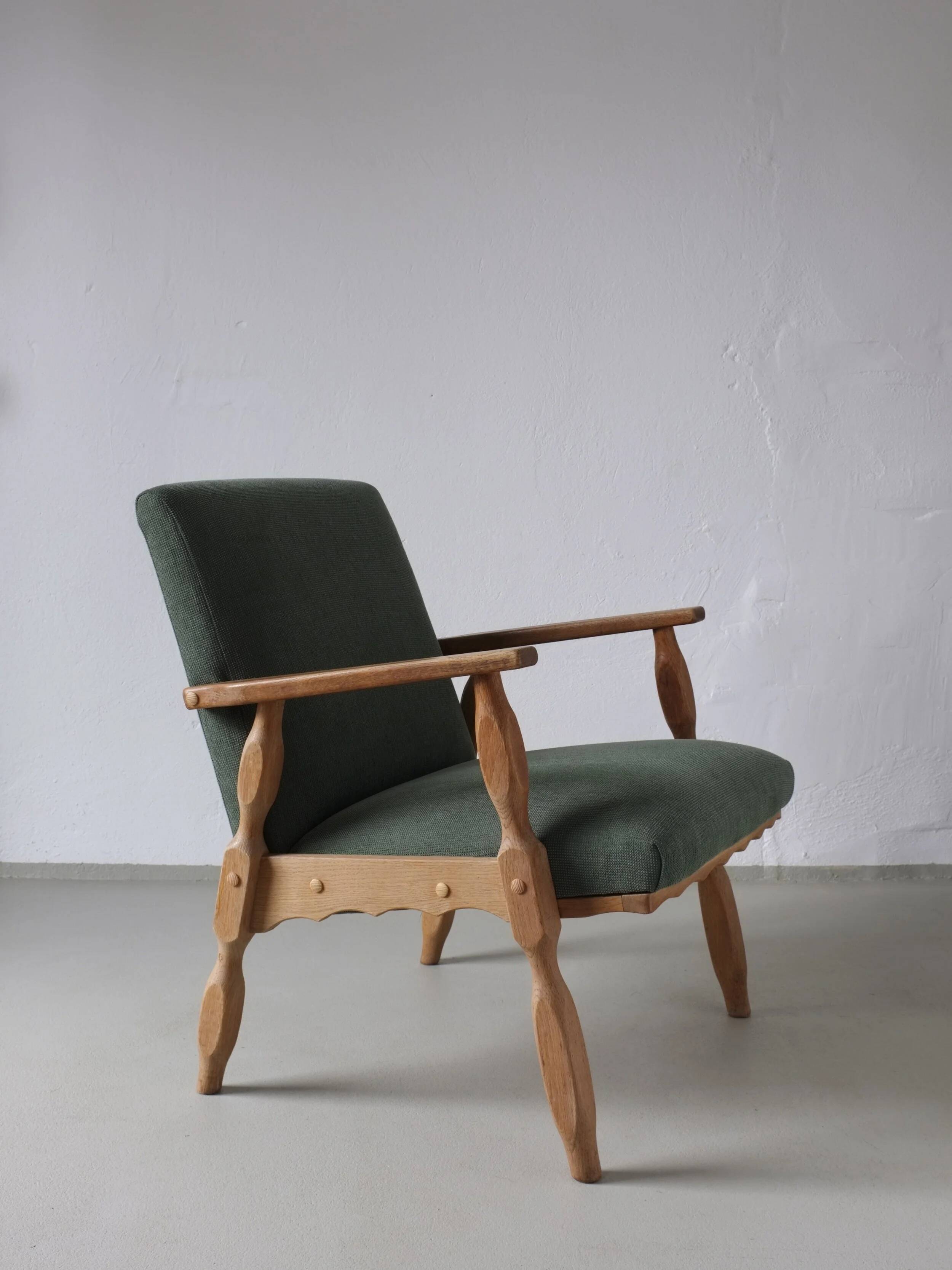 Henning Kjaernulf oak scalloped lounge chair | Denmark | 1950s