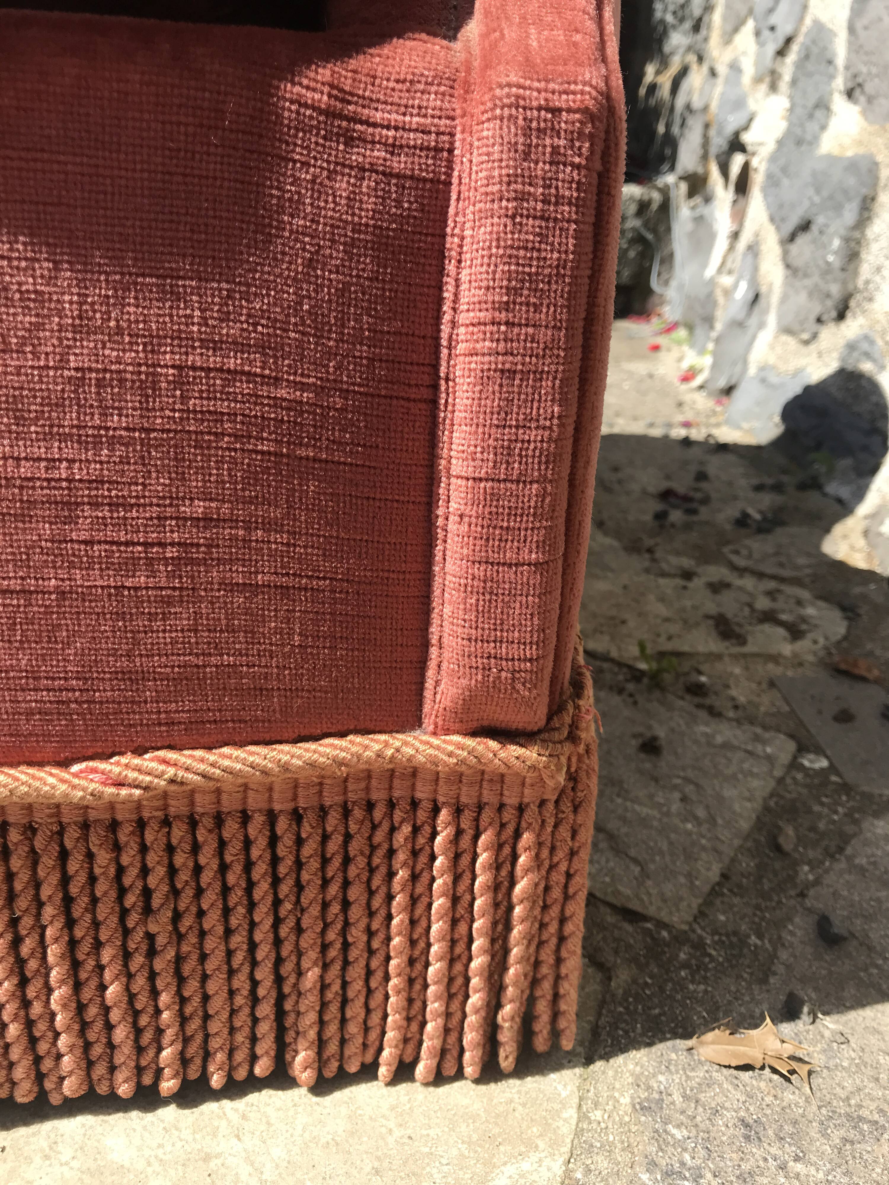 Vintage pink velvet armchair with fringes