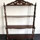Large Napoleon III shelf in turned wood with a pediment.