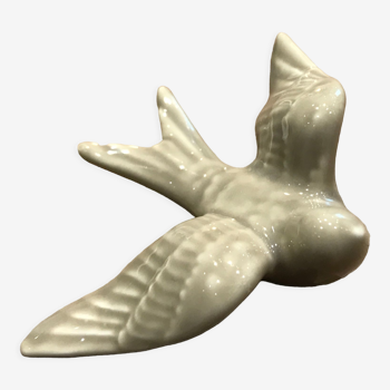 Small model beige ceramic swallow