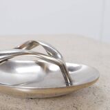 Aluminum pocket emptier flip flop