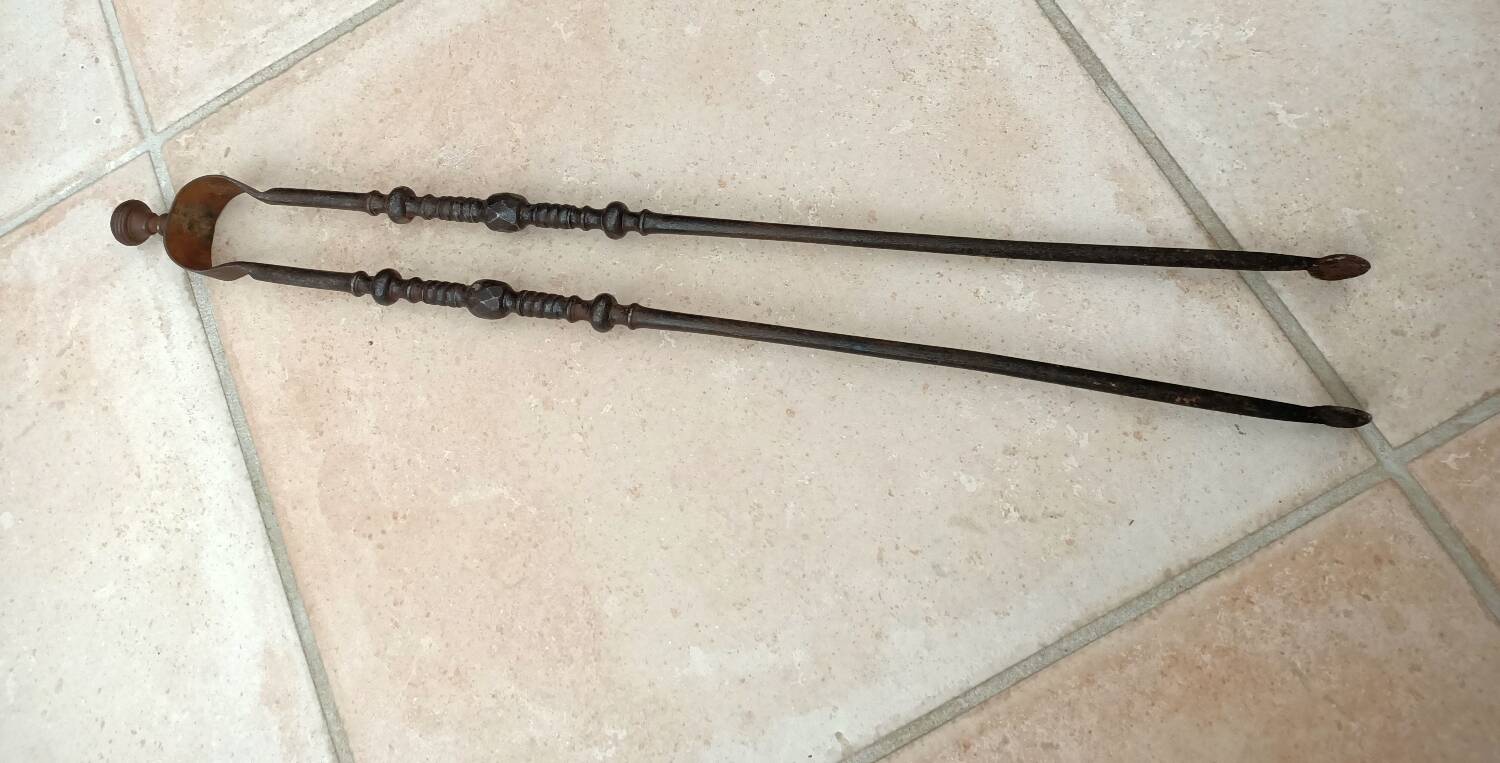 18th century fireplace tongs in wrought iron