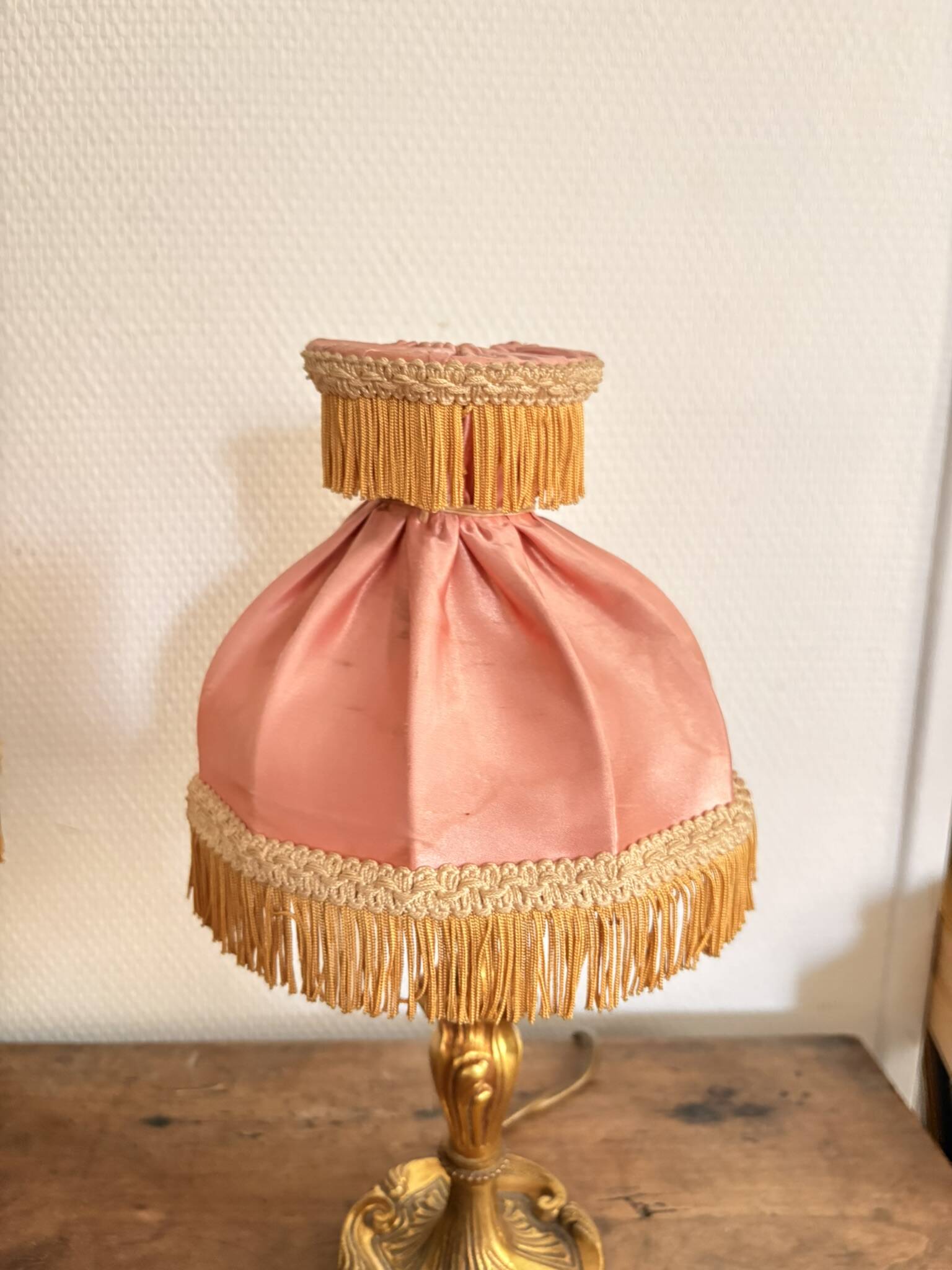 Pair of Bedside Lamps in Gilded Bronze with Pink Silk Shades and Fringes in Louis XV Style