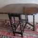 Antique farmhouse patinated extendable table in oak with carved edge, 1900