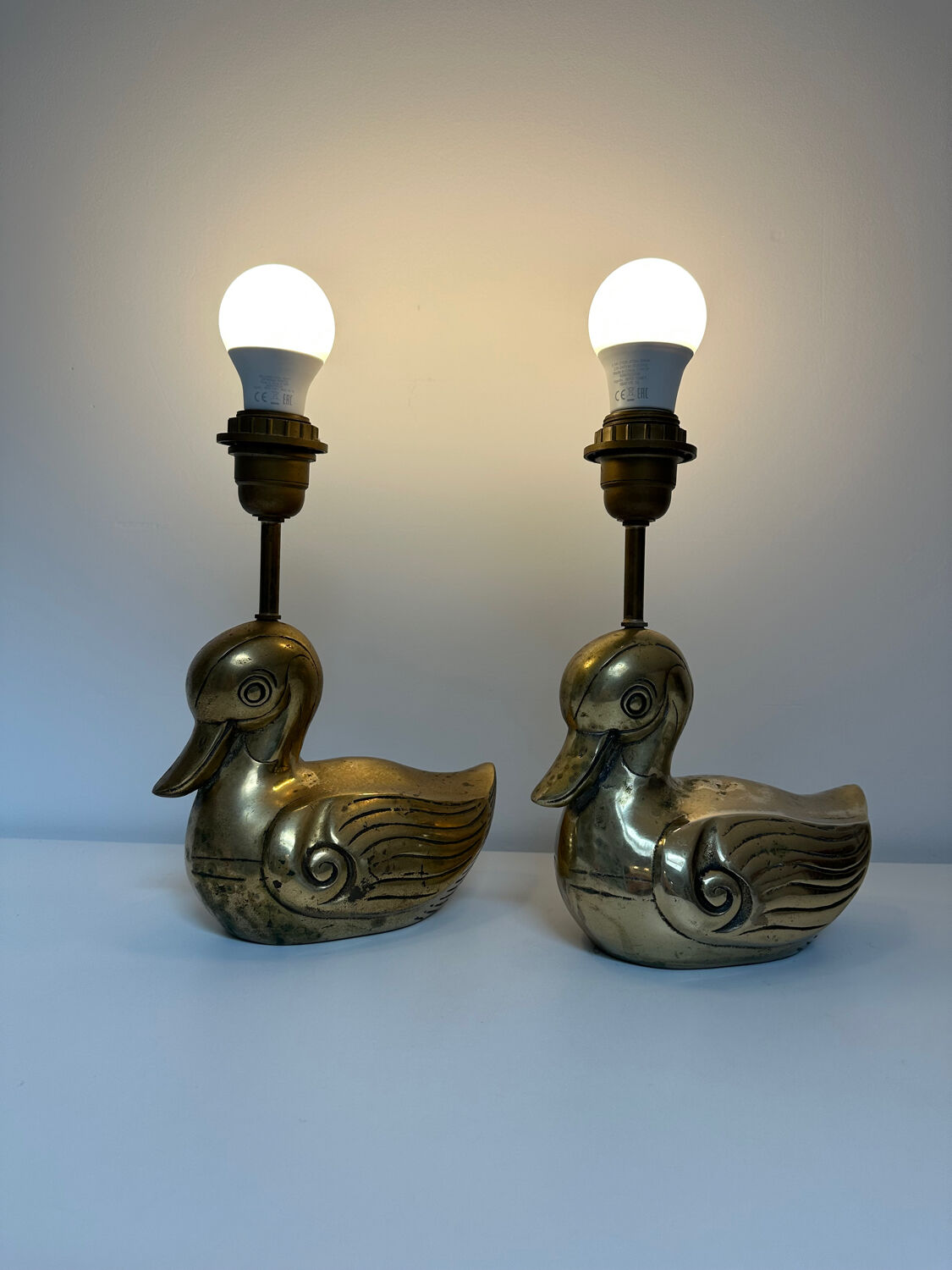 Pair of brass duck lamps, 1980