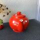 Vintage red teapot with white polka dots