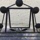 Wrought iron coat rack.