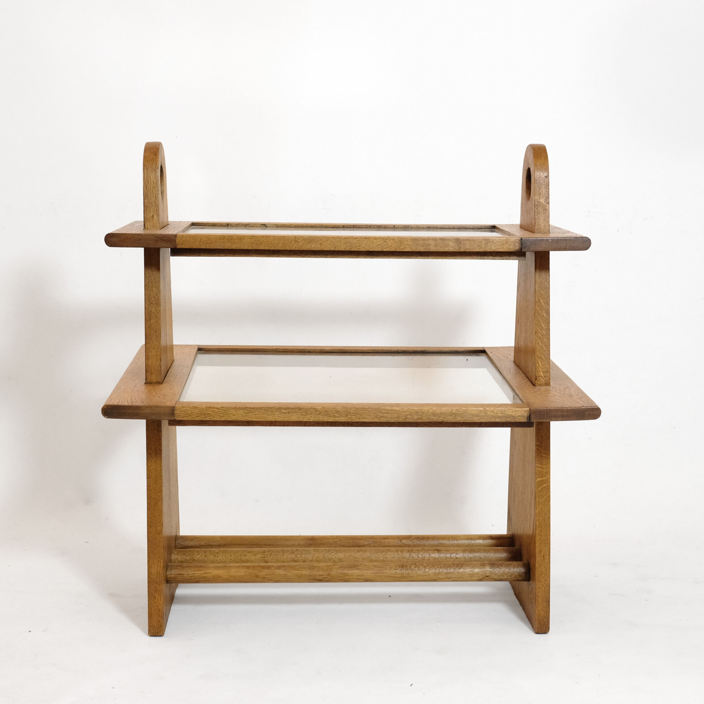 Served in oak and glass from the 50s and 60s.