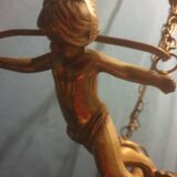 Antique chandelier decorated with cherubs and putti angels taken from the attic