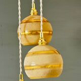Suspension triple vintage glass globes in frosted yellow and gold.