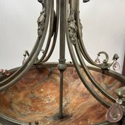 Napoleon III chandelier in bronze and alabaster with eight light arms, 19th century.