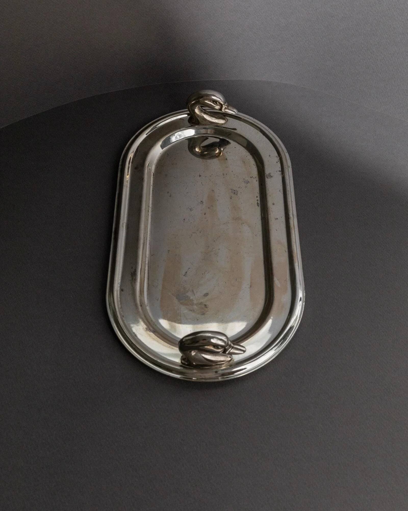 1960s vintage silver-plated oval tray with swan head handles.