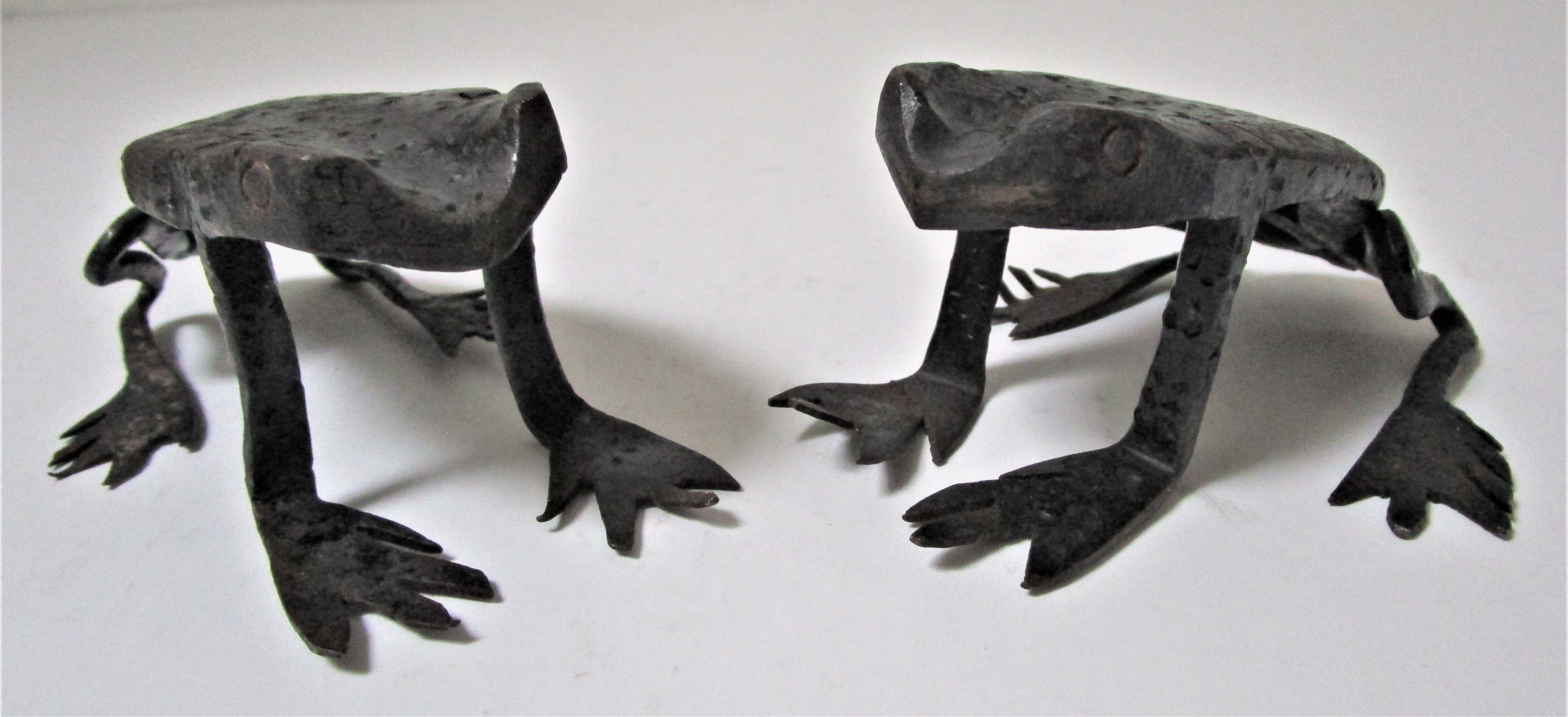 Two metal clipboard frogs patinated vintage brutalist