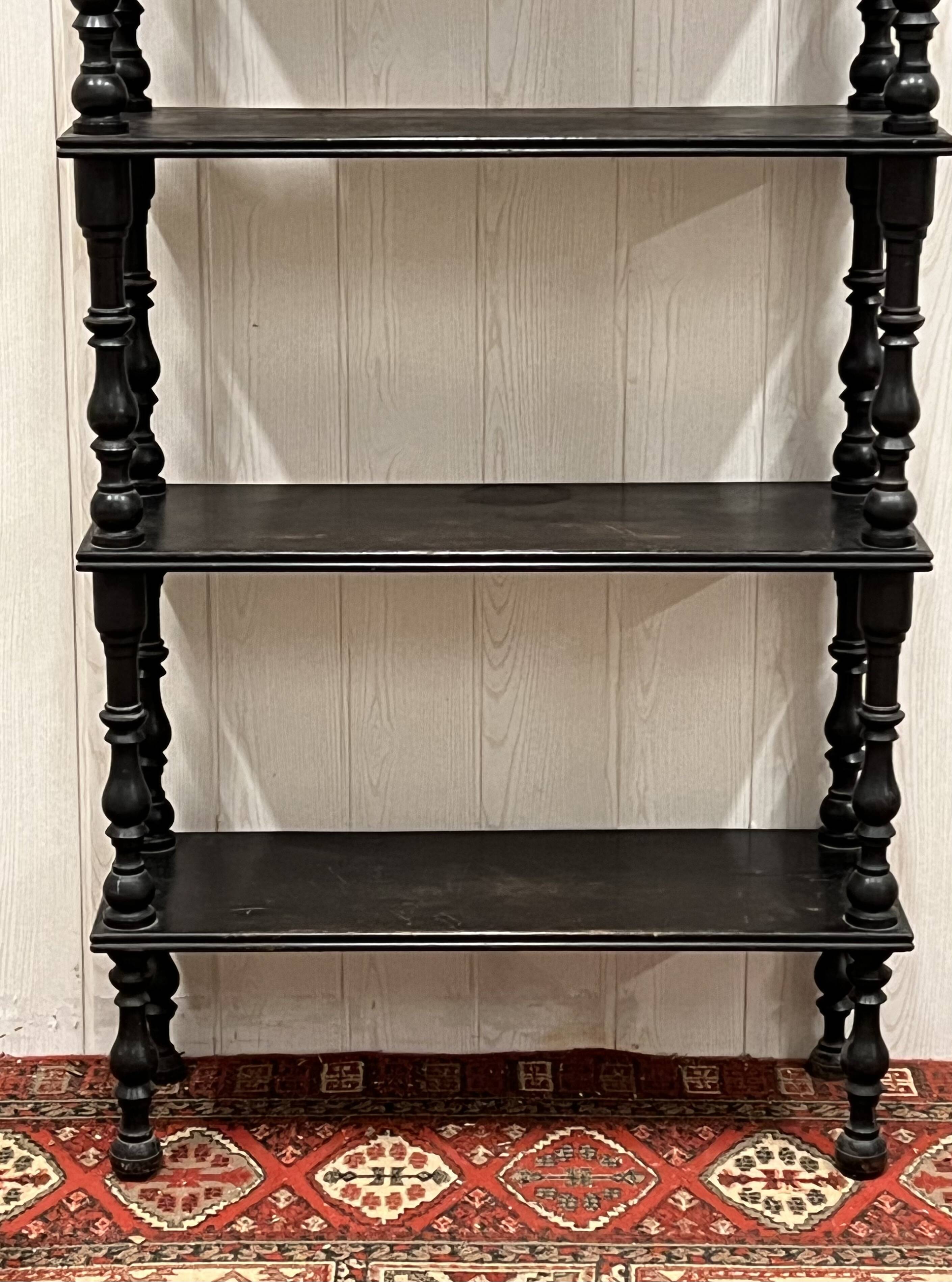 Blackened wooden shelf.