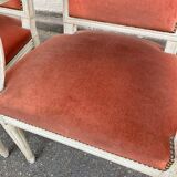 2 Louis XVI armchairs in solid wood and orange velvet.