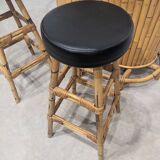 Vintage sixties tiki bar with stools.