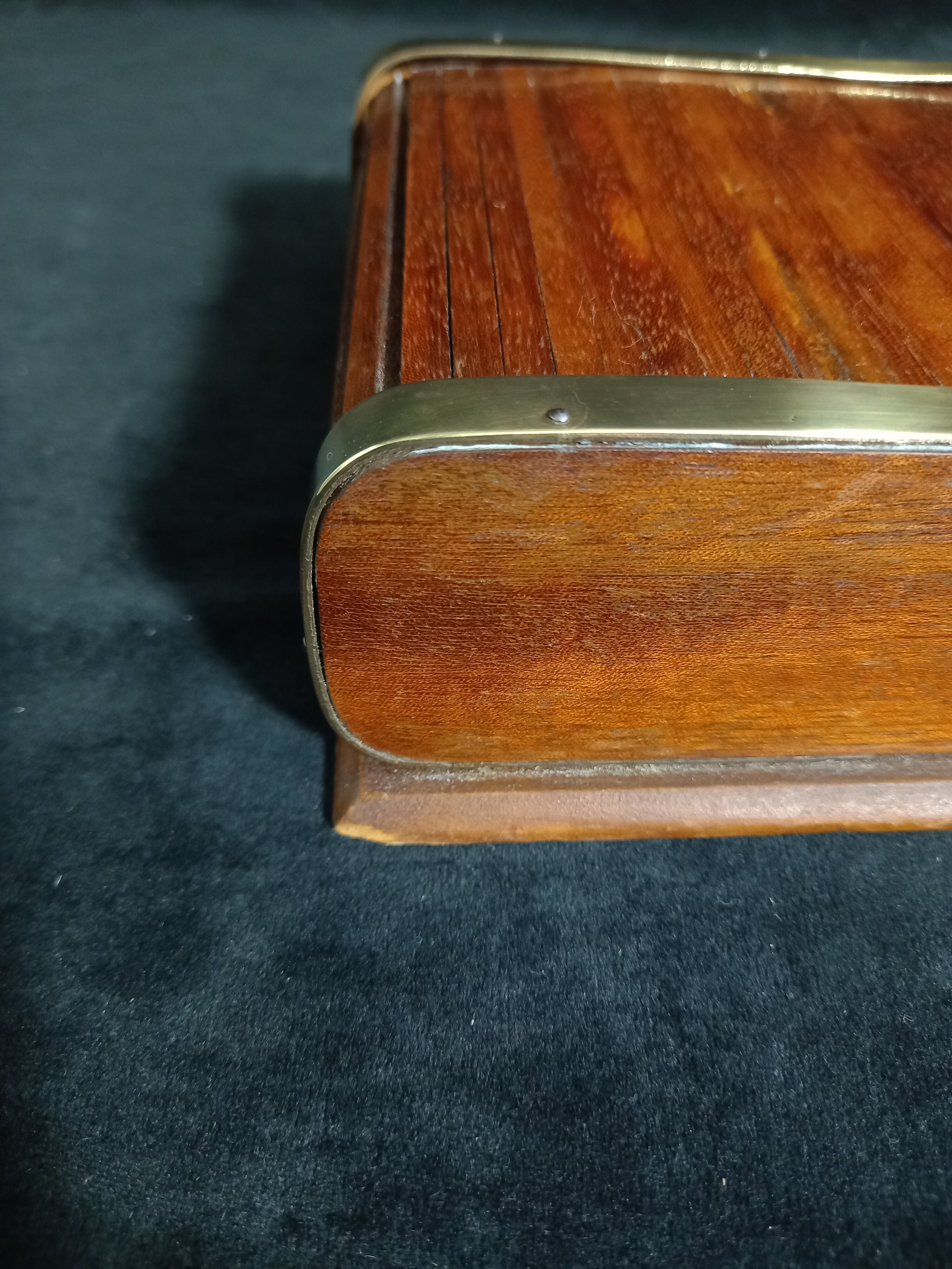 Art deco cigar box with sliding lid and brass finishes