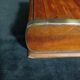 Art deco cigar box with sliding lid and brass finishes
