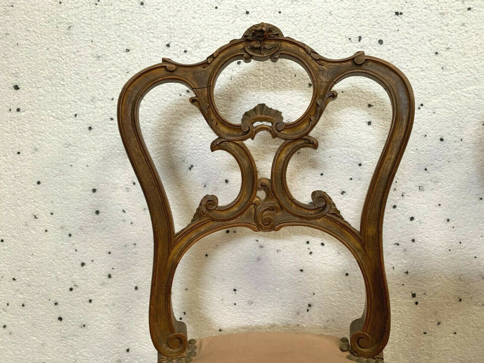 Pair of Louis XV style chairs in 20th century carved walnut