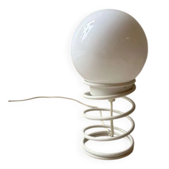 Minimalist spiral table lamp from the 80s with a frosted glass shade.