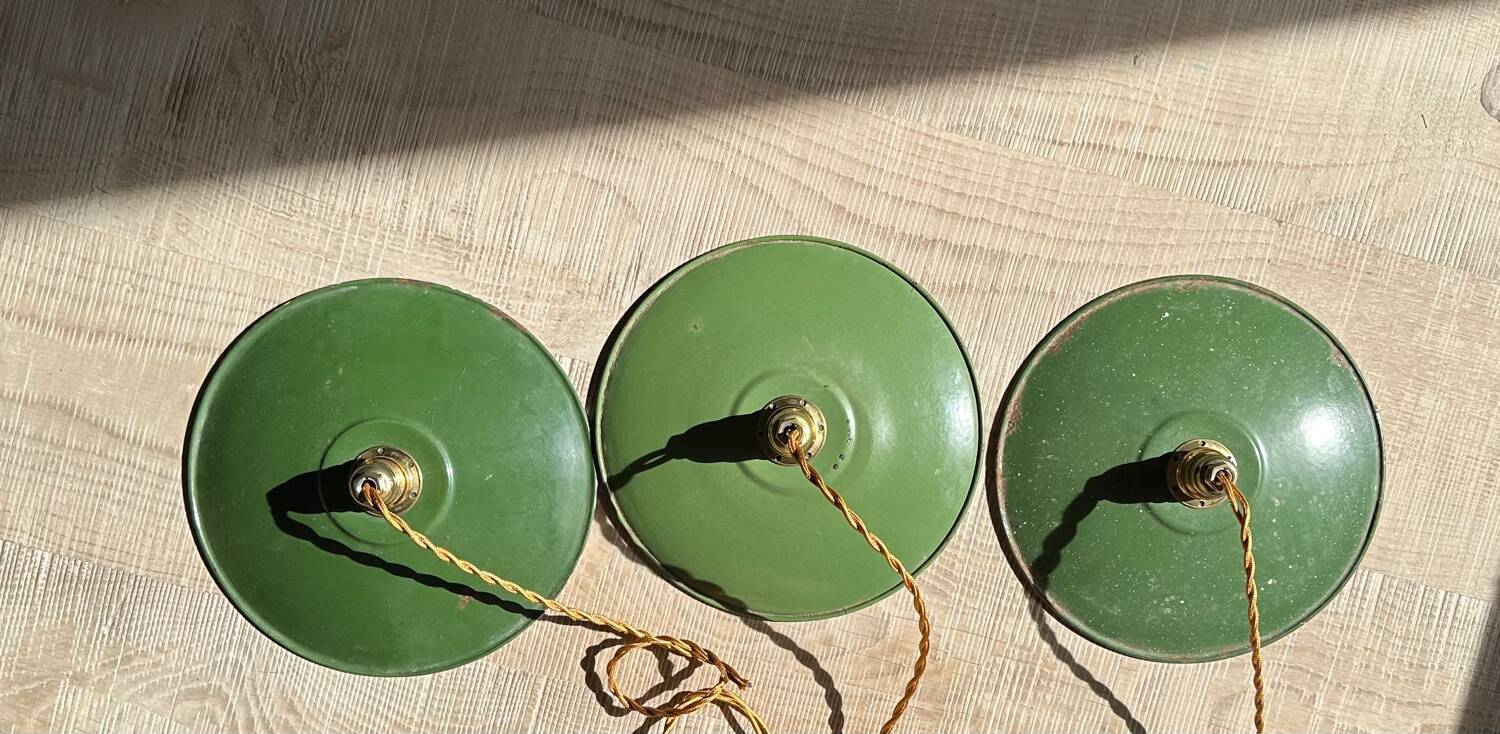 Trio of vintage green enamelled sheet metal lampshade pendants