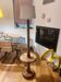Oak floor lamp made of turned wood.