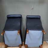 Pair of upholstered low chairs without arms