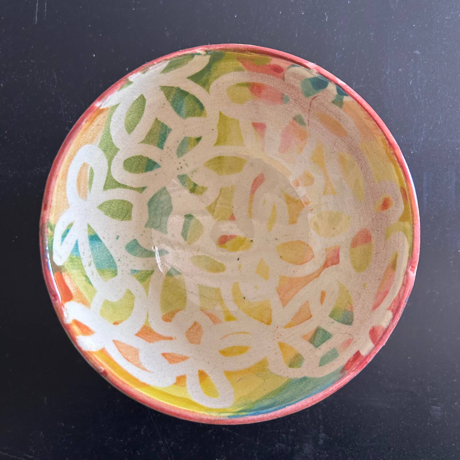 Signed bowl painted with stencil