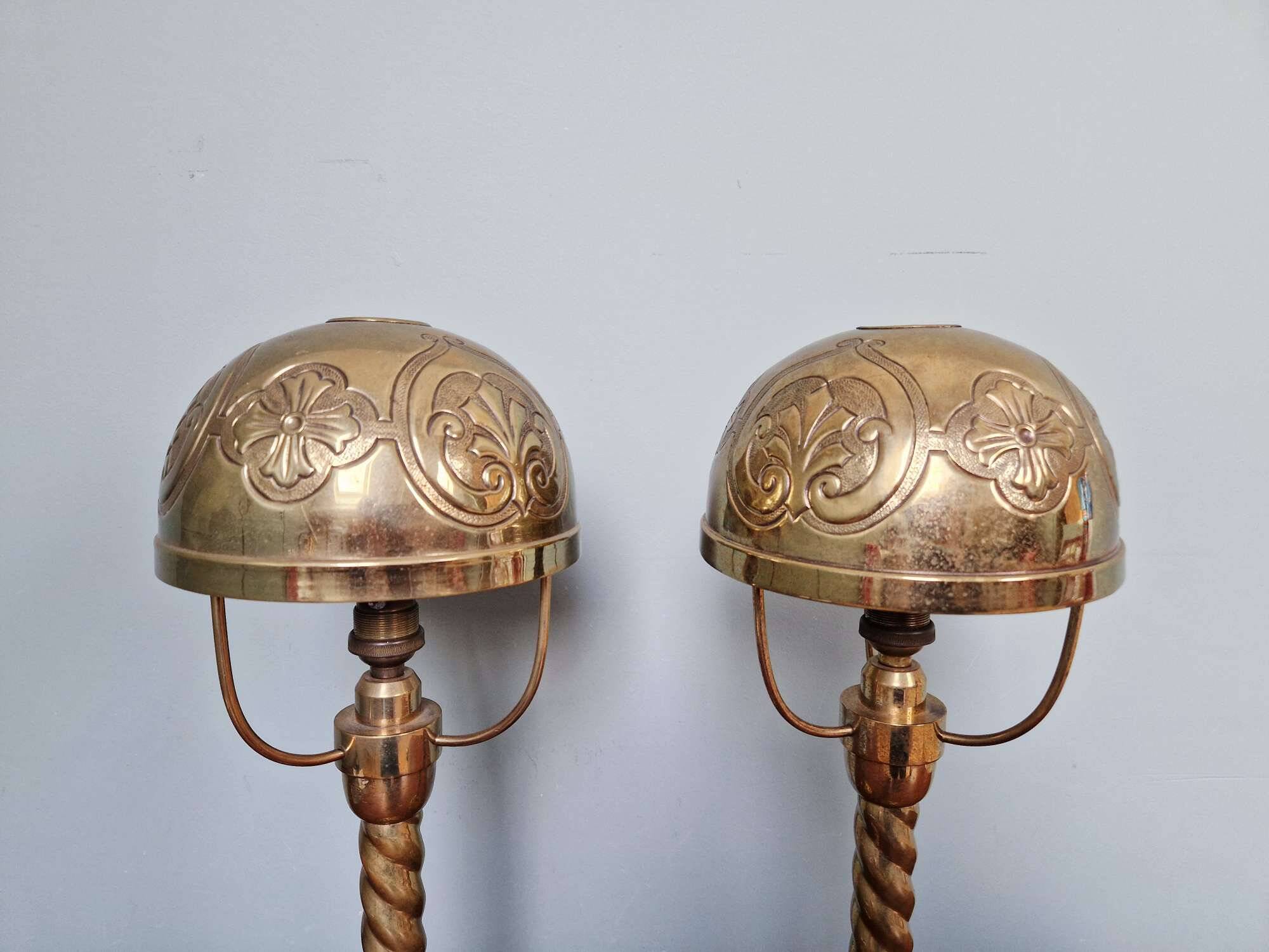 Pair of bronze and brass table lamps, early 20th century