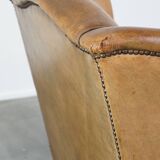 Sheep leather wingback chair with patina