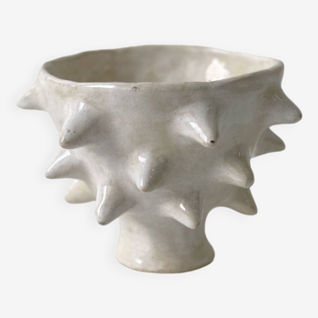 White spiky cup