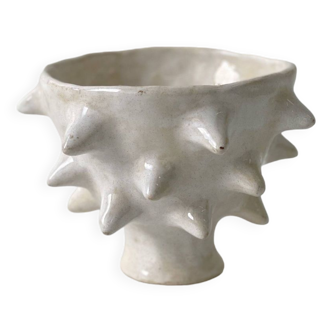 White spiky cup