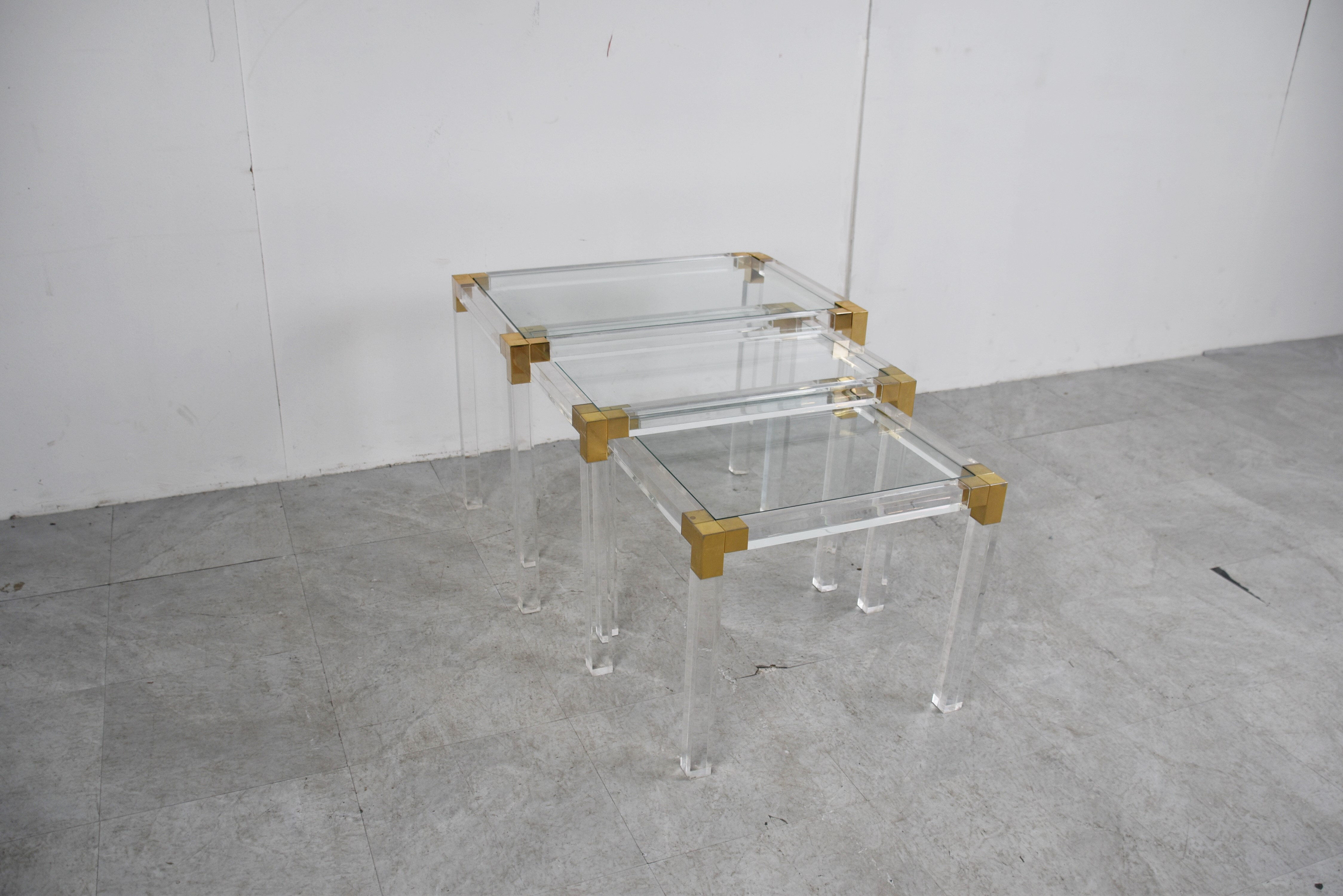 Vintage lucite and brass nesting tables, 1970s