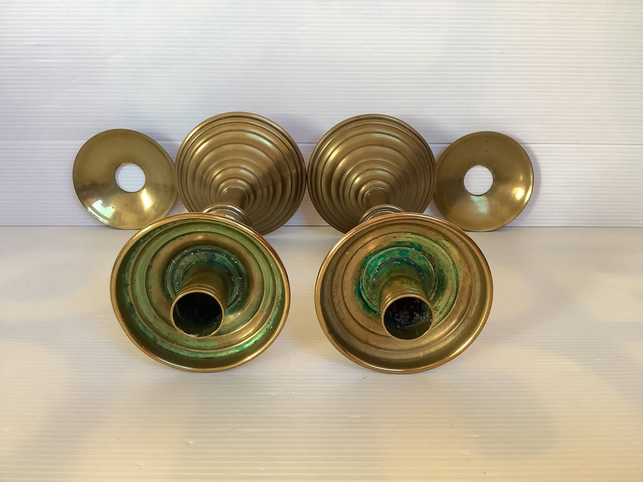 Pair of tulip foot candlesticks in brass