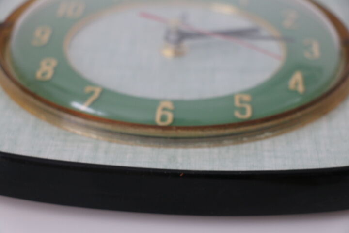 JAZ green formica wall clock