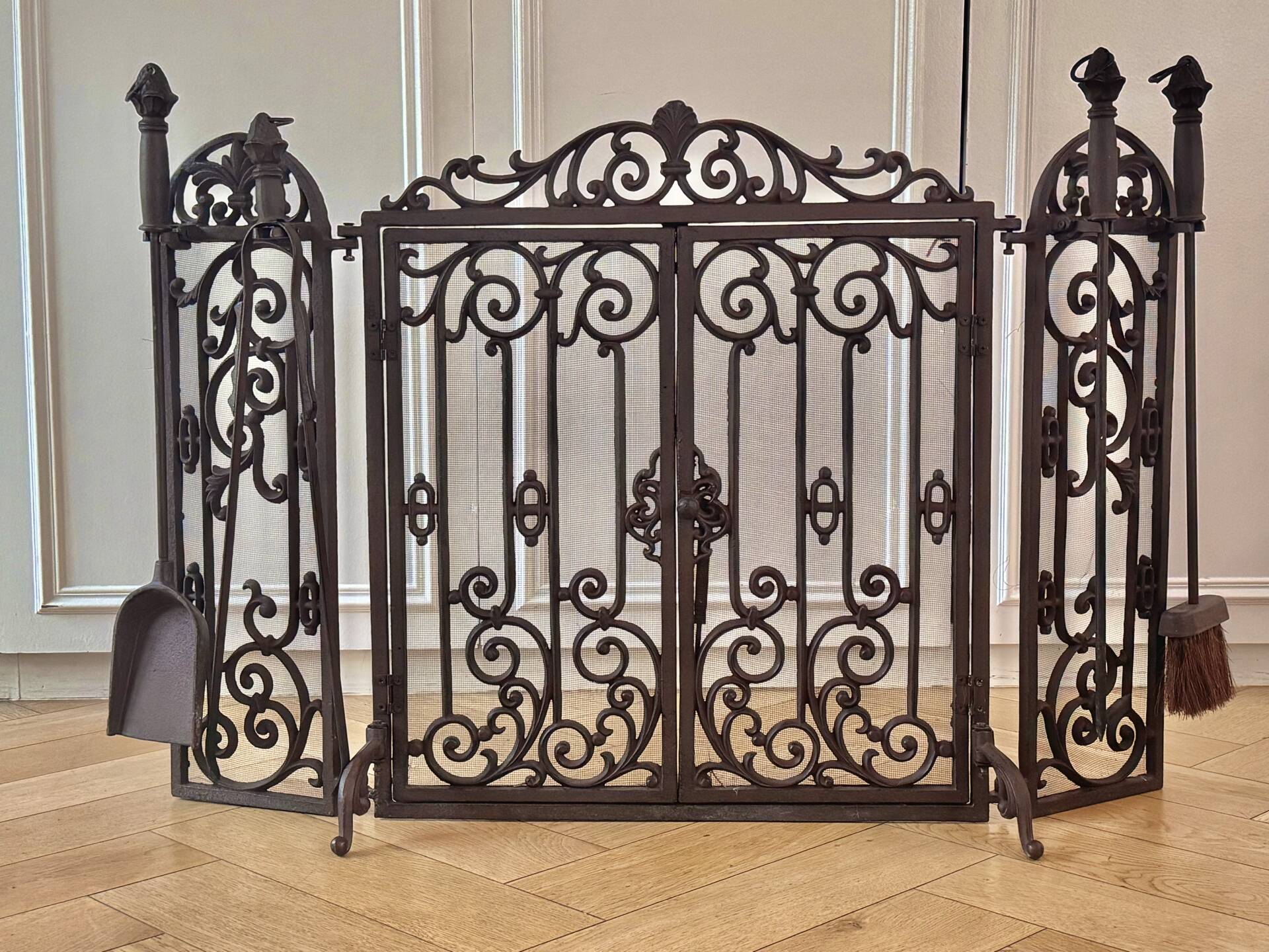 Wrought iron fire screen set with log basket, accessories.