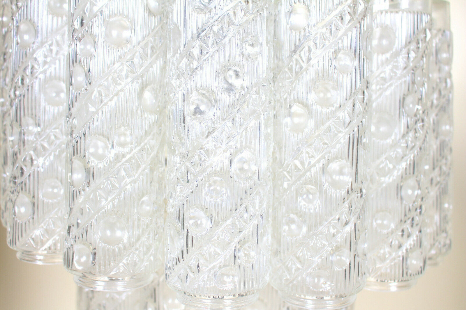 Metal chandelier and molded glass from the middle of the twentieth century