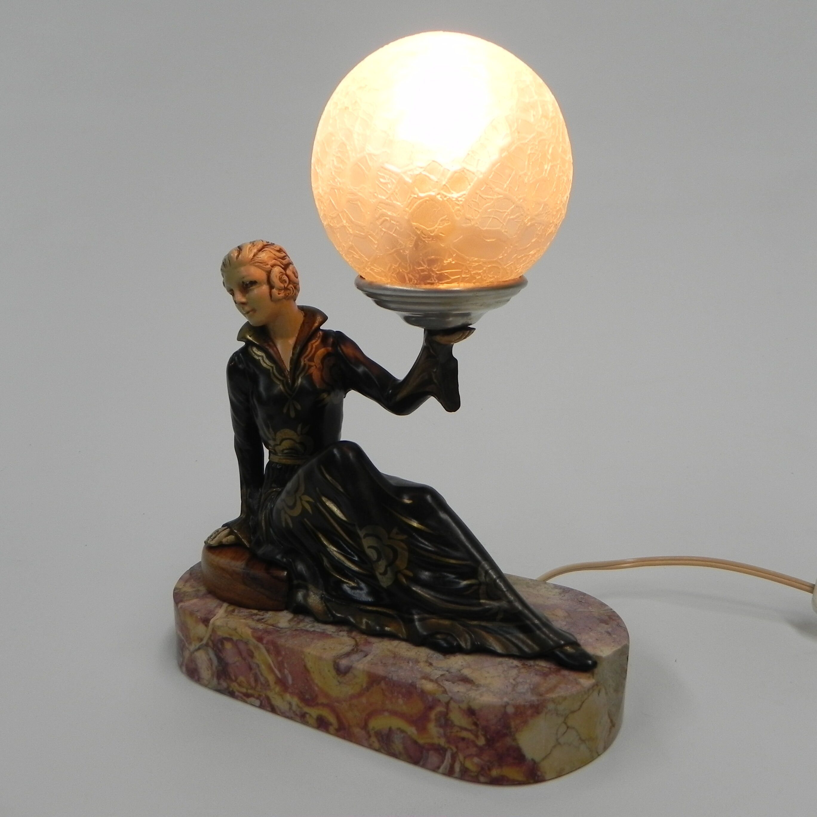 Art deco desk lamp sitting woman with globe